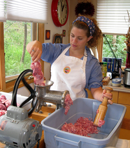 Grimding Pork Into Sausage Mix